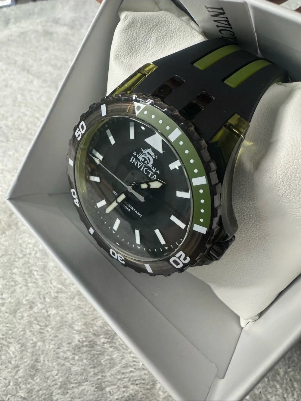 #141 Invicta Black Dial Watch with Green Bezel Accents
